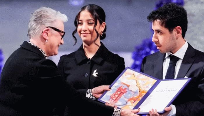 দুই সন্তানের হাতে কারাবন্দী মায়ের নোবেল পুরস্কার দুই সন্তানের হাতে কারাবন্দী মায়ের নোবেল পুরস্কার